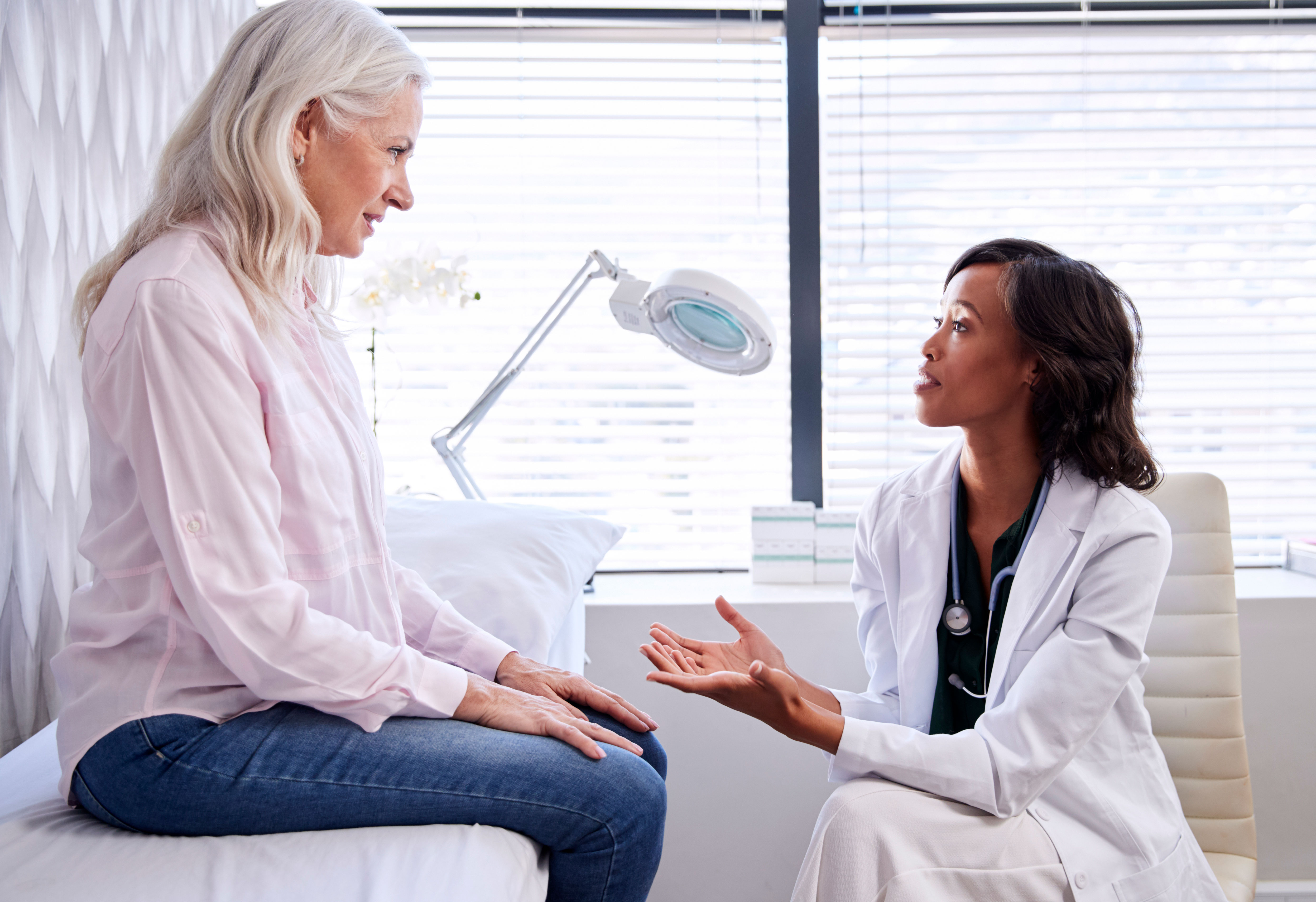 Patient talking to her doctor