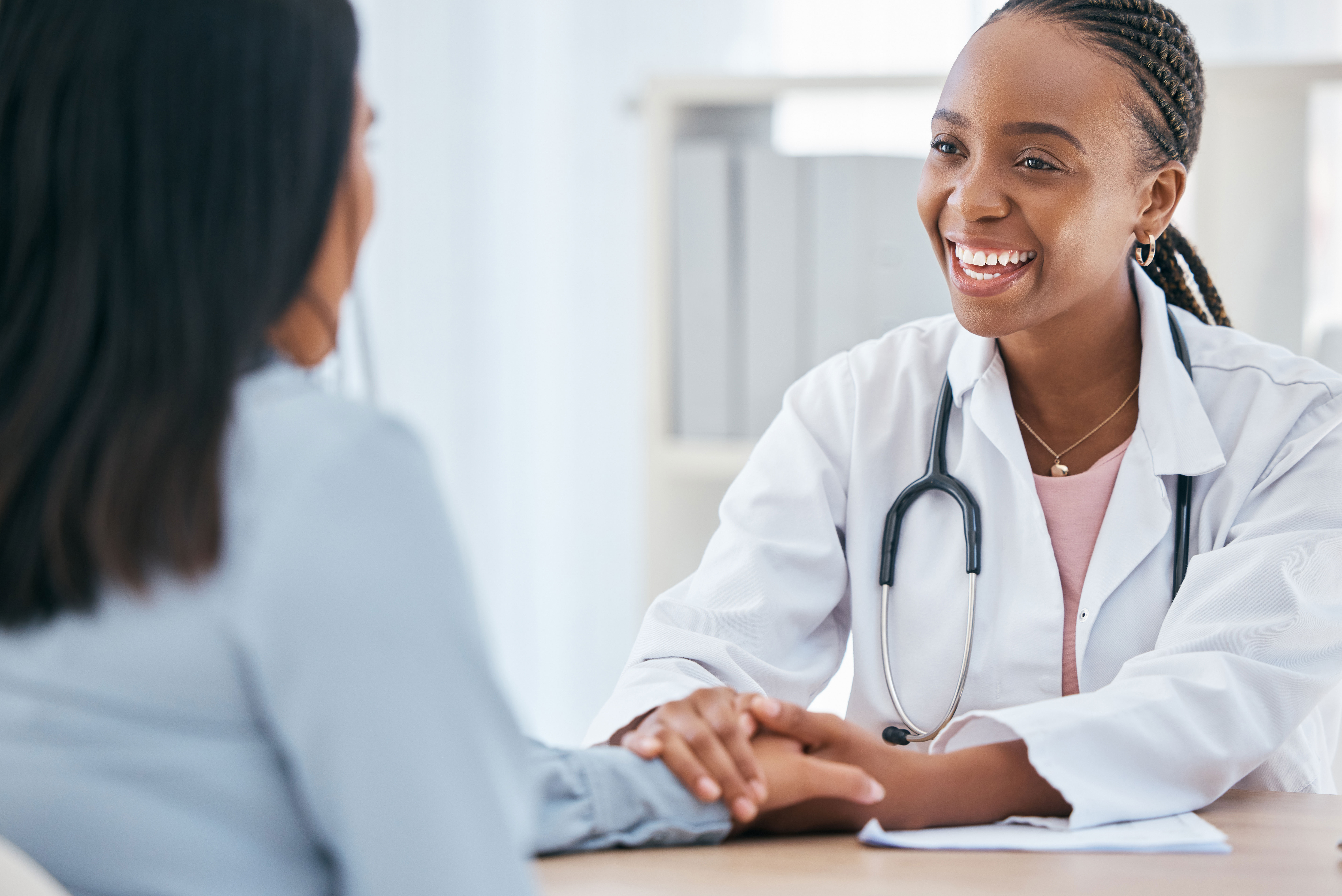 Doctor and a patient with a good relationship Doctor and a patient with a good relationship