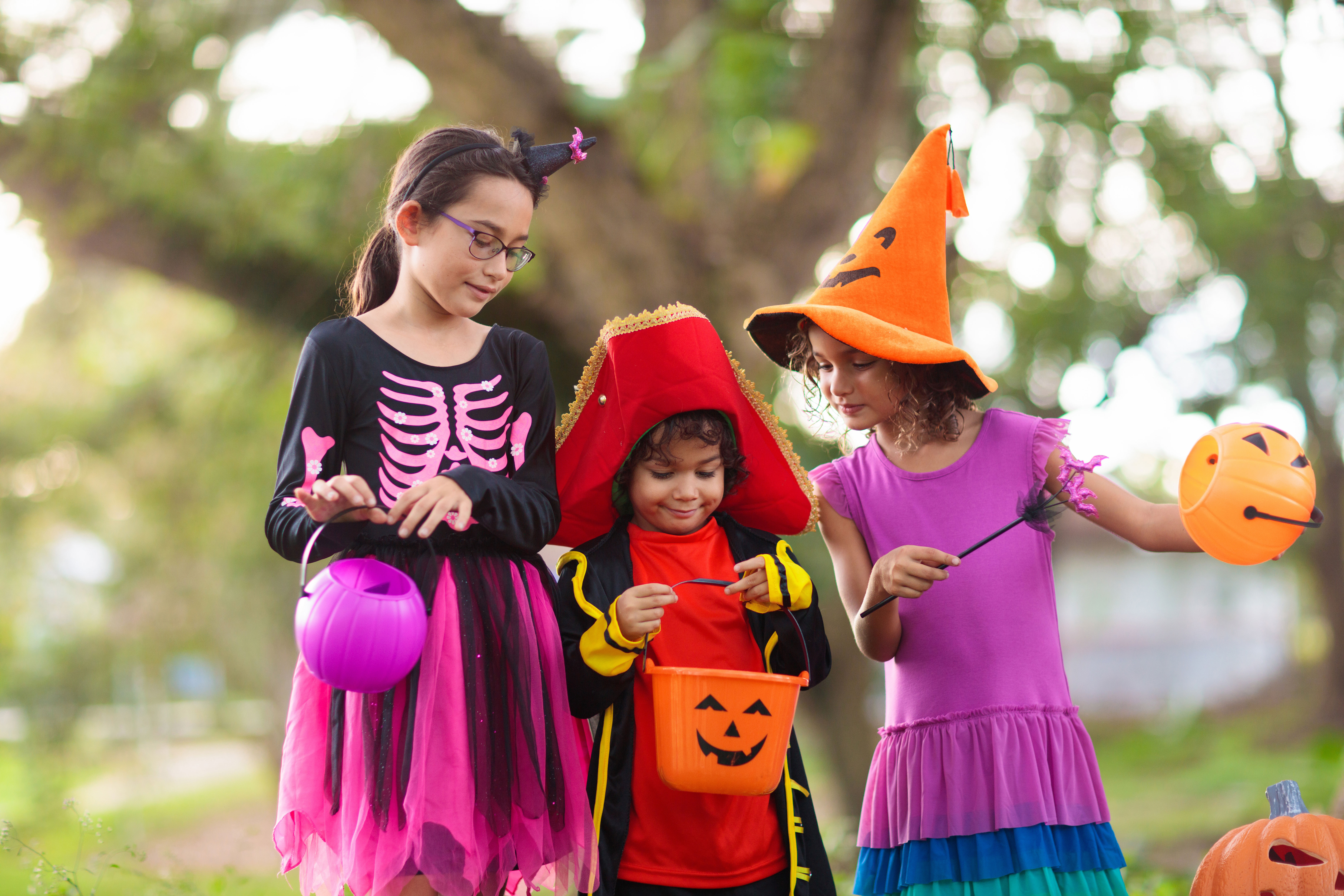 Kids trick-or-treating Kids trick-or-treating