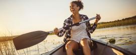 A woman enjoying the outdoors on Delmarva by canoe