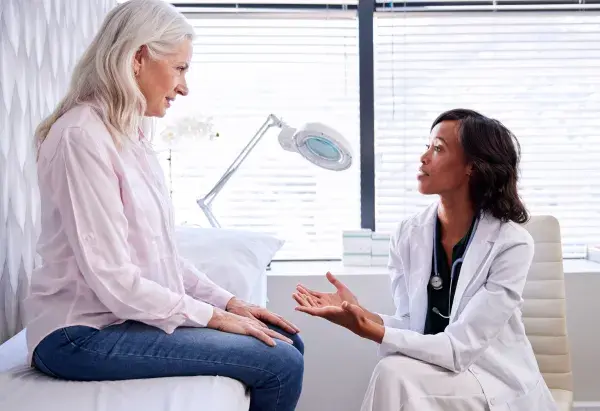 Patient talking to her doctor