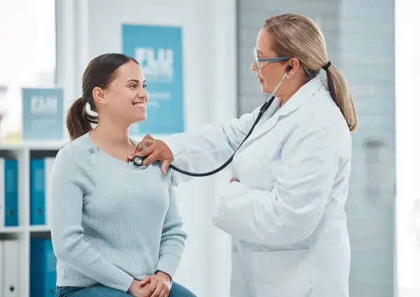 Provider examining a patient
