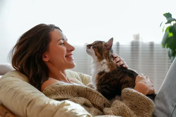 Woman relaxing with cat