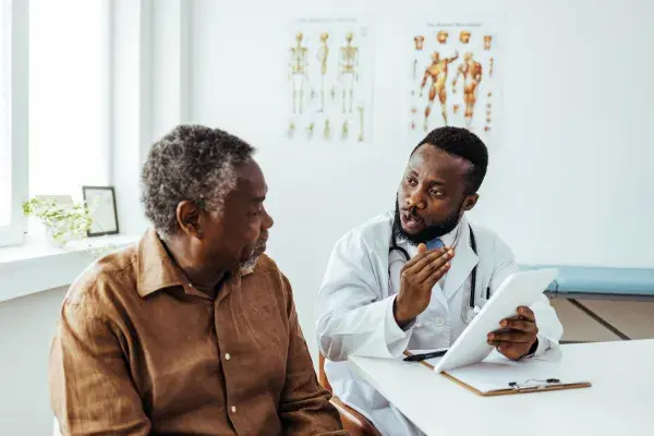 Doctor explaining something to patient