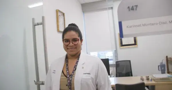 Karinnet Montero-Diaz, MD, walks out of her office
