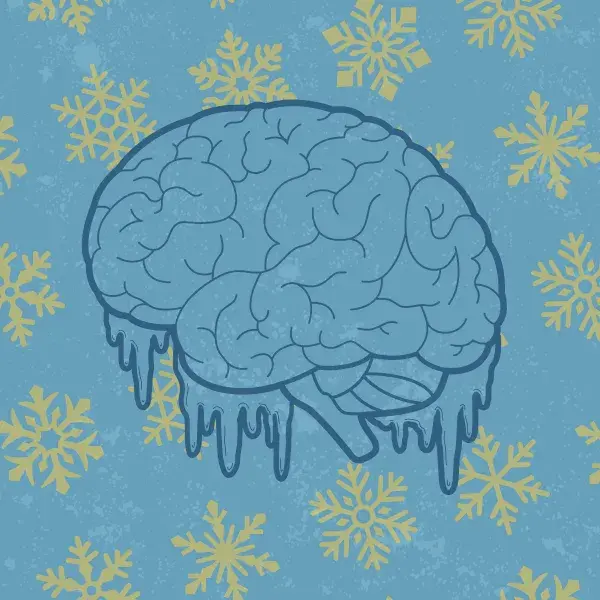 Graphic of brain freeze, showing icicles on a brain and snowflakes