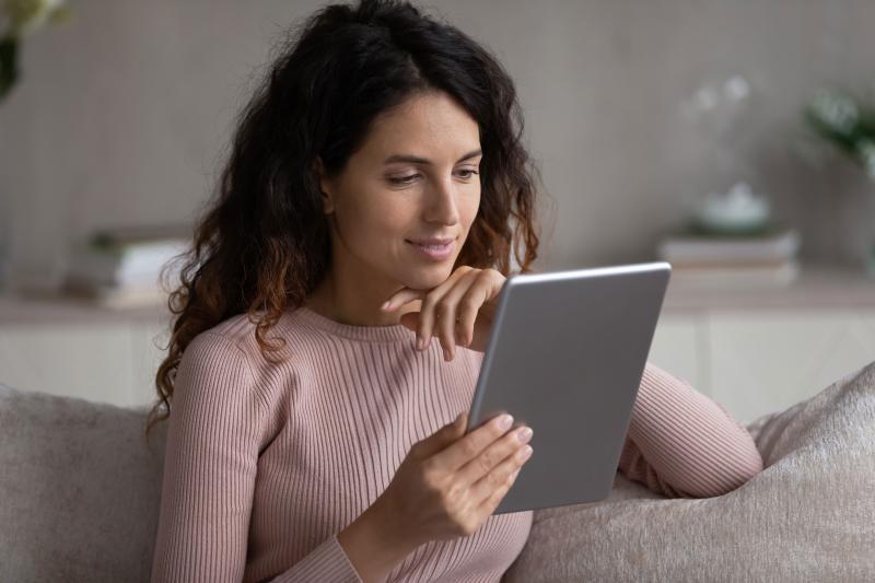 Women reading on tablet
