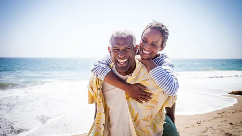 Happy couple on the beach