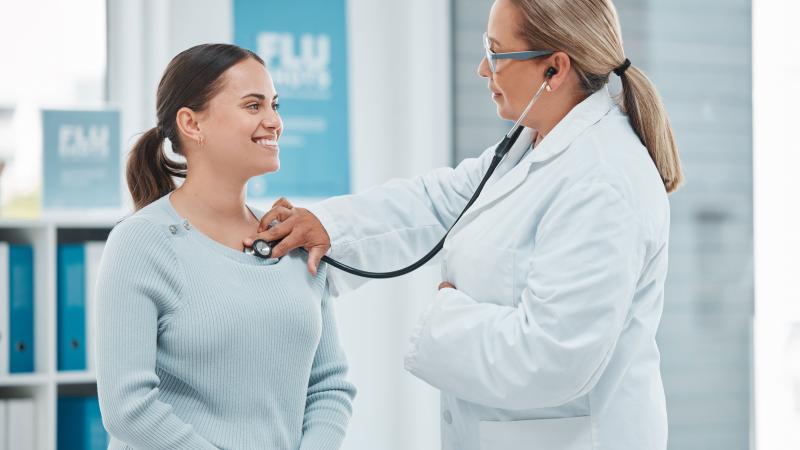 Provider examining a patient