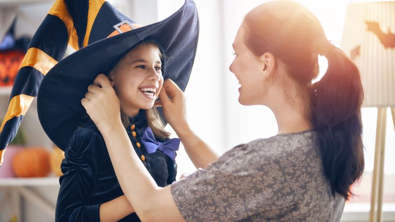 Mother and daughter getting ready for Halloween