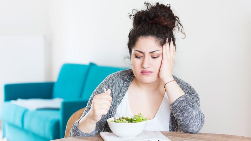 A woman trying to eat healthy but is a picky eater