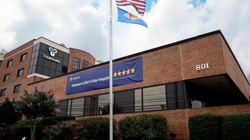 The outside of TidalHealth Nanticoke, showing a five-star banner