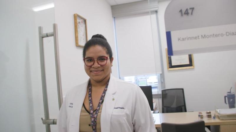 Karinnet Montero-Diaz, MD, walks out of her office