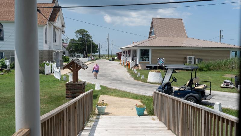View from TidalHealth's community clinic on Smith Island as a patient walks toward the building.