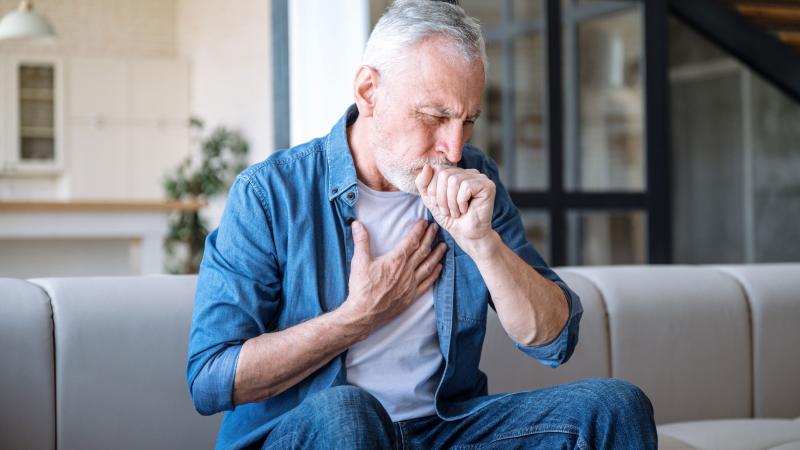 Older man suffering from an asthma attack