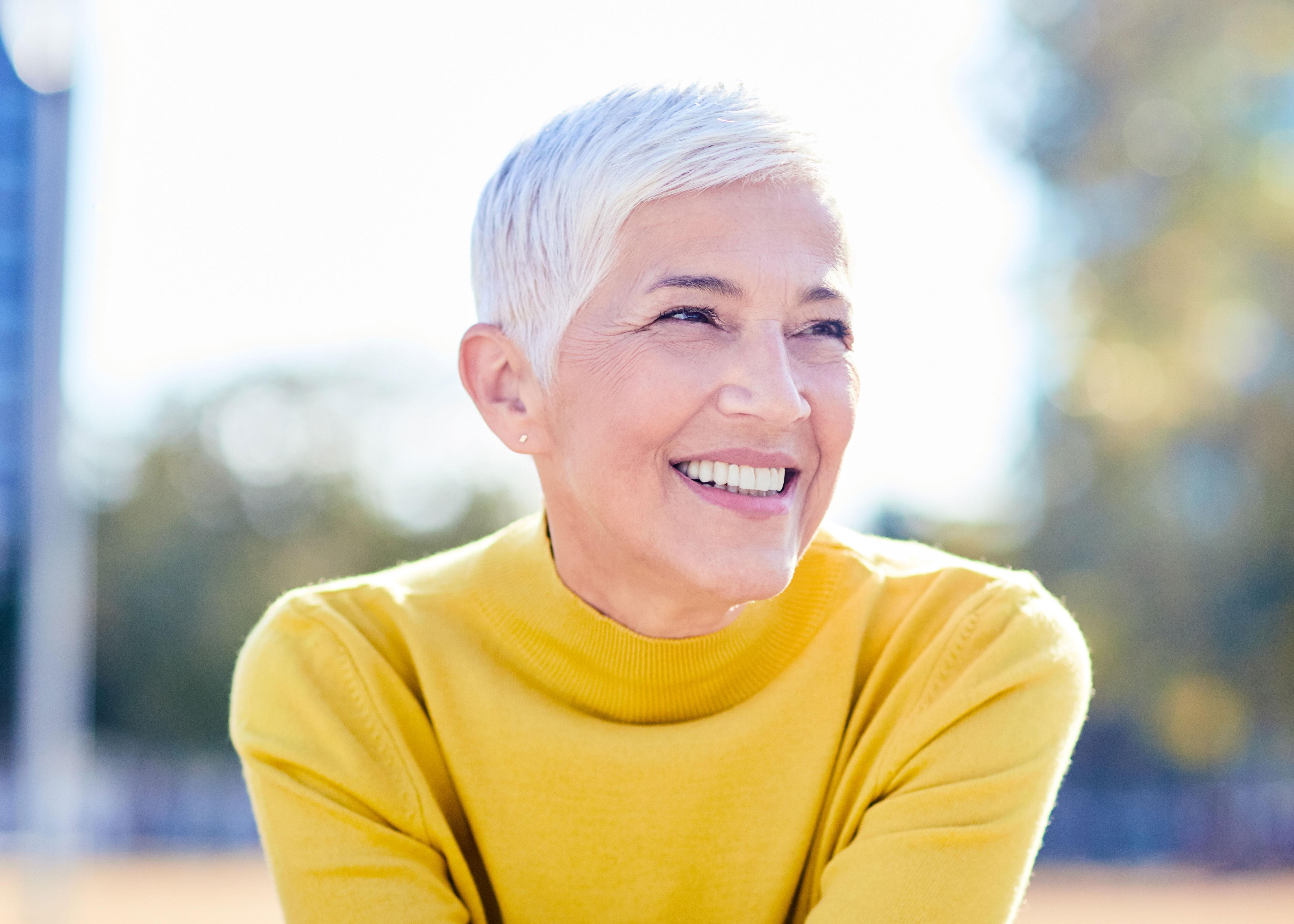 A healthy woman smiling.
