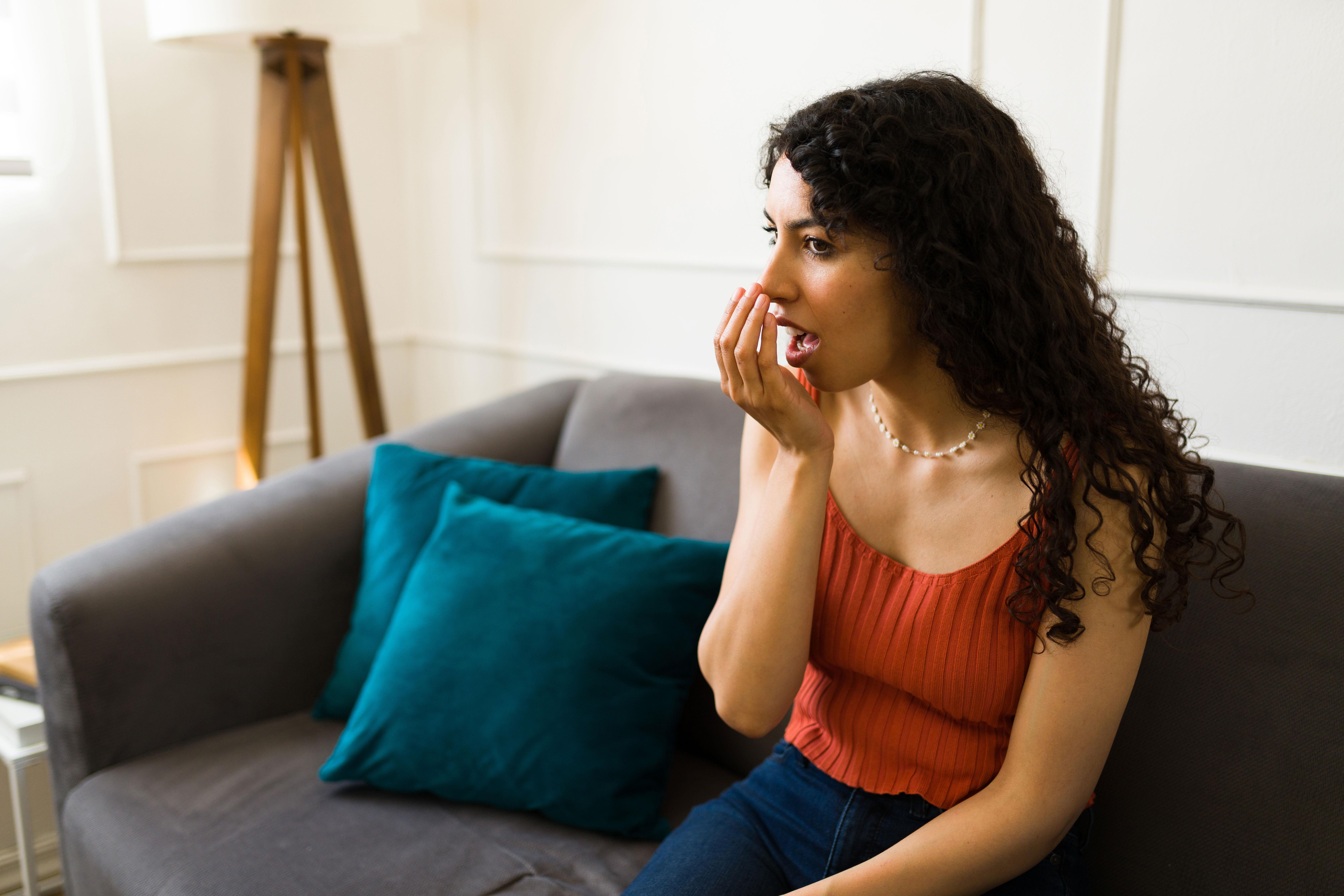 Woman checking her breath