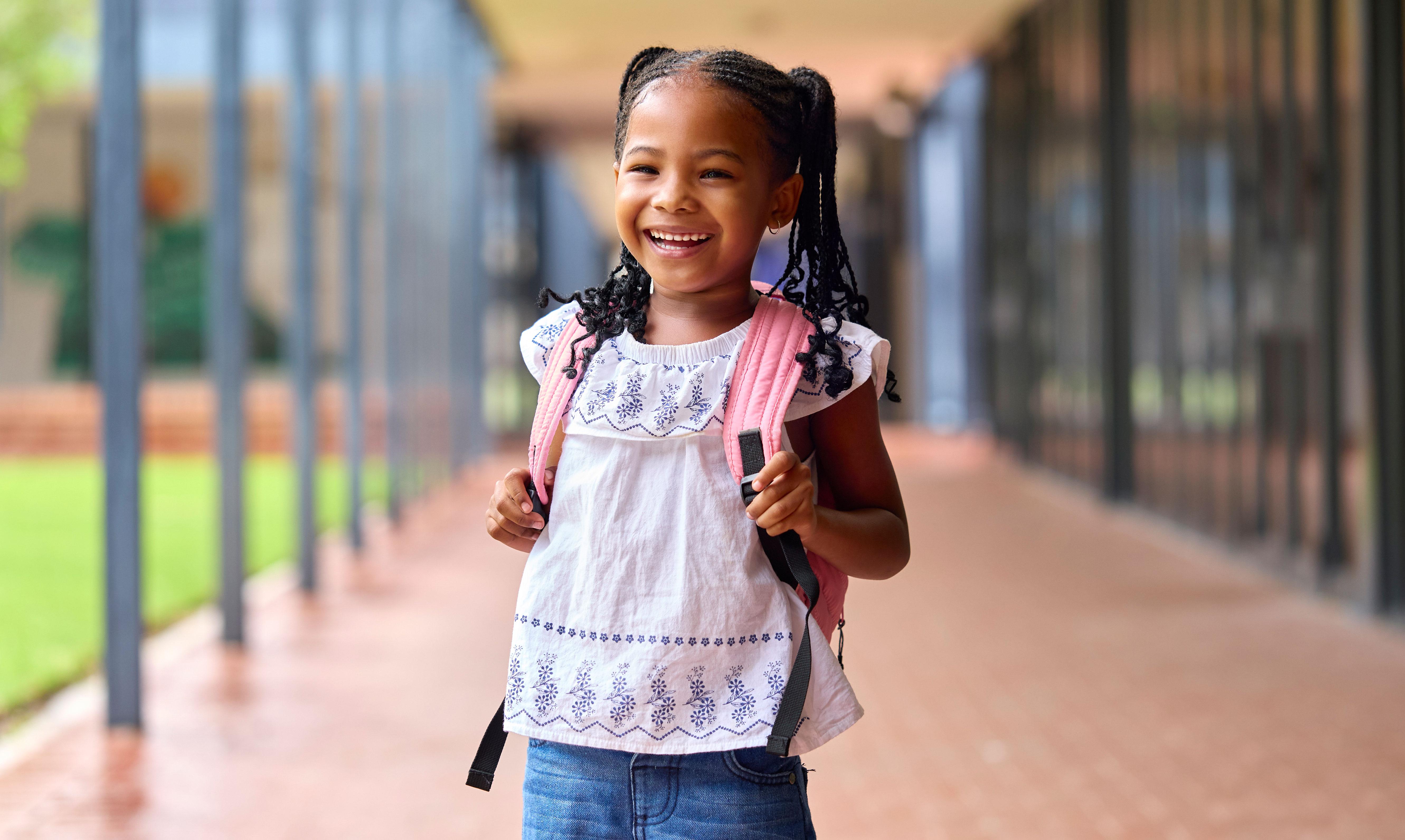Elementary school child excited for back-to-school