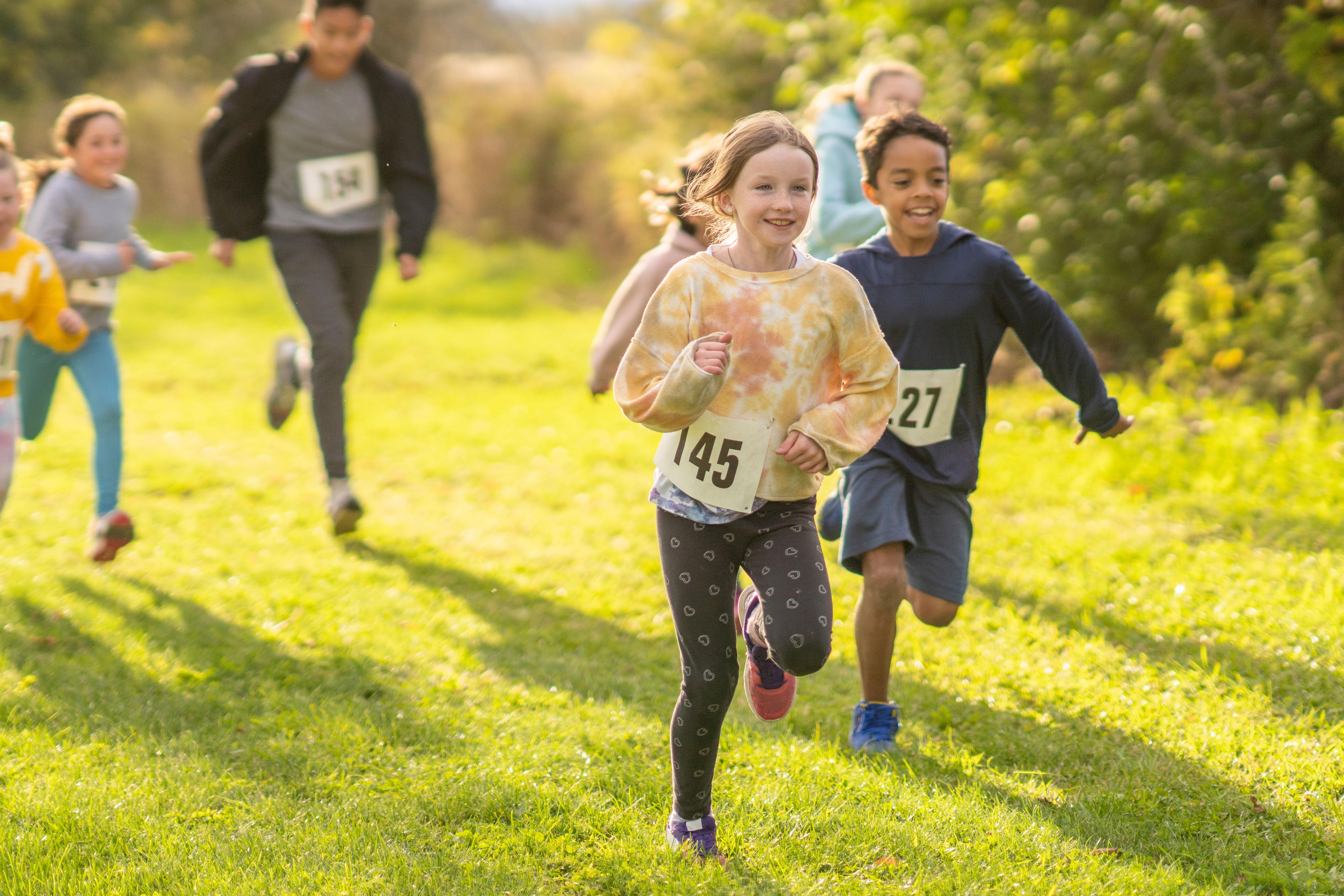 Children running a race in the fall