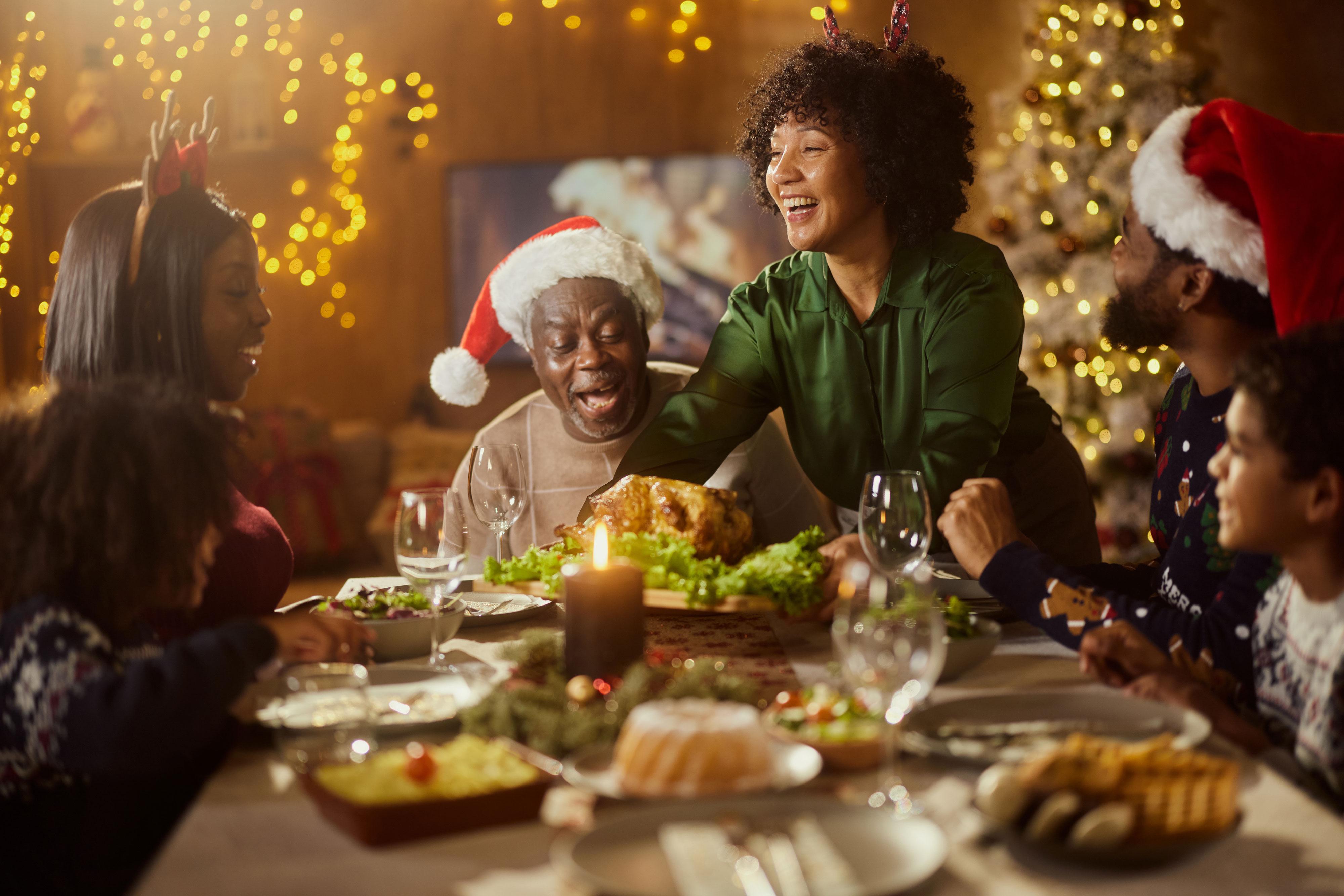 Family celebrates Christmas dinner together