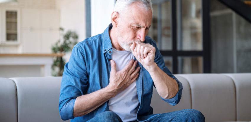 Older man suffering from an asthma attack